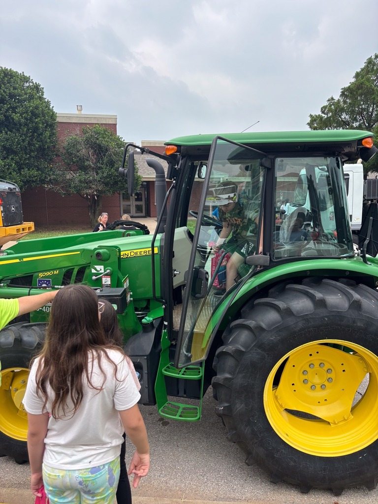 Various photos of City of Norman at Truman Elementary.
