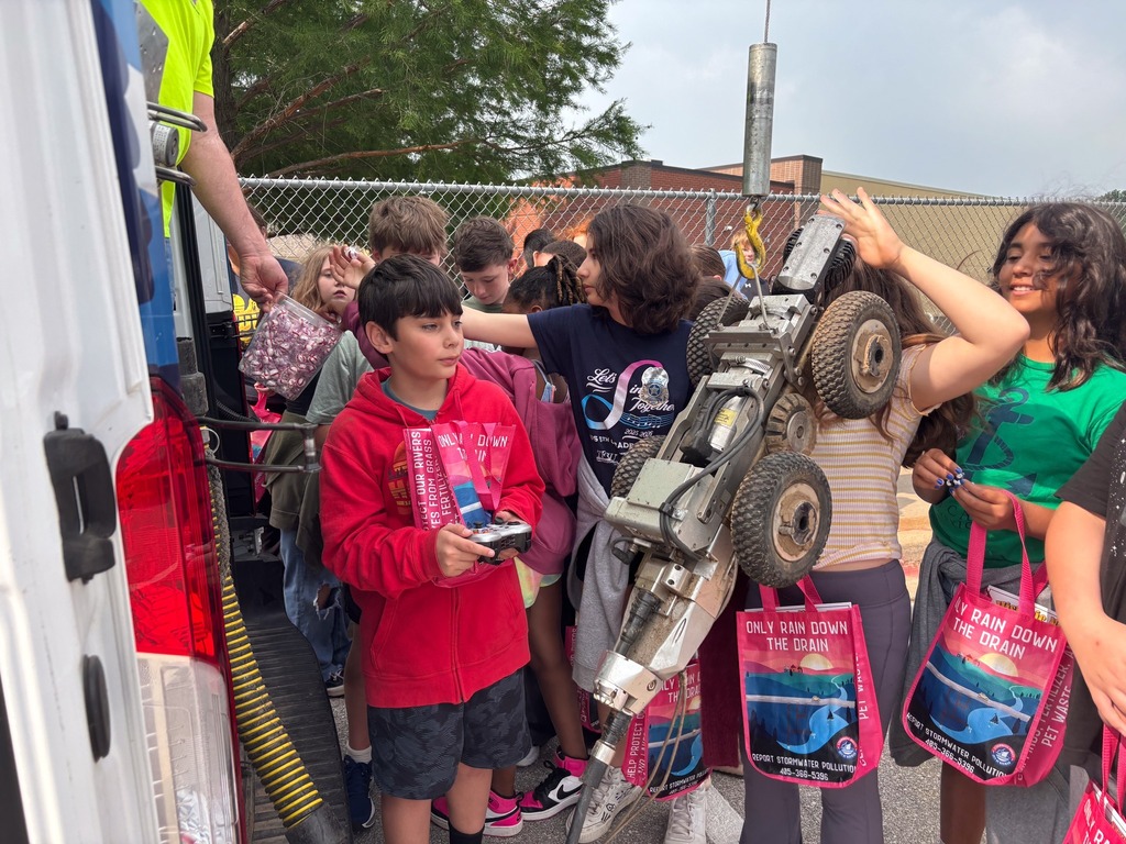 Various photos of City of Norman at Truman Elementary.