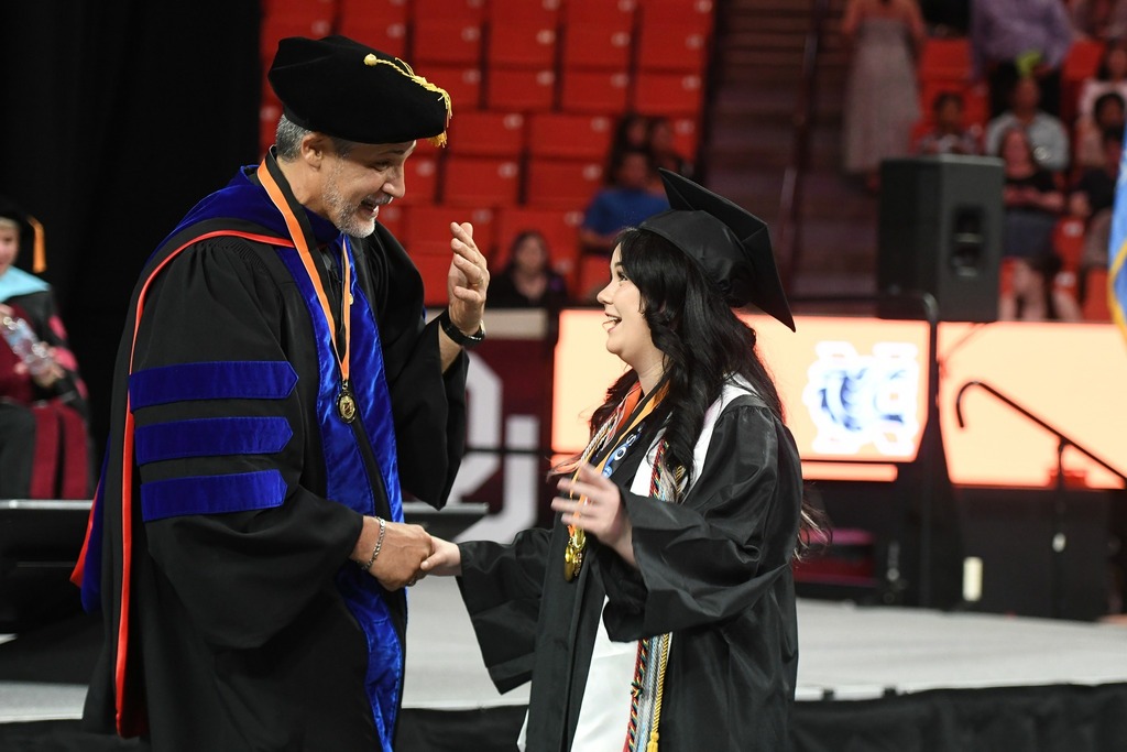 Various photos of Norman High graduation.