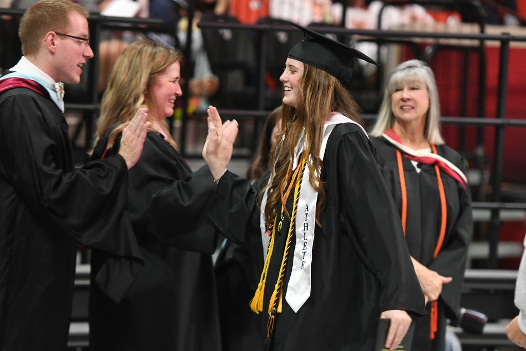 Various photos of Norman High graduation.