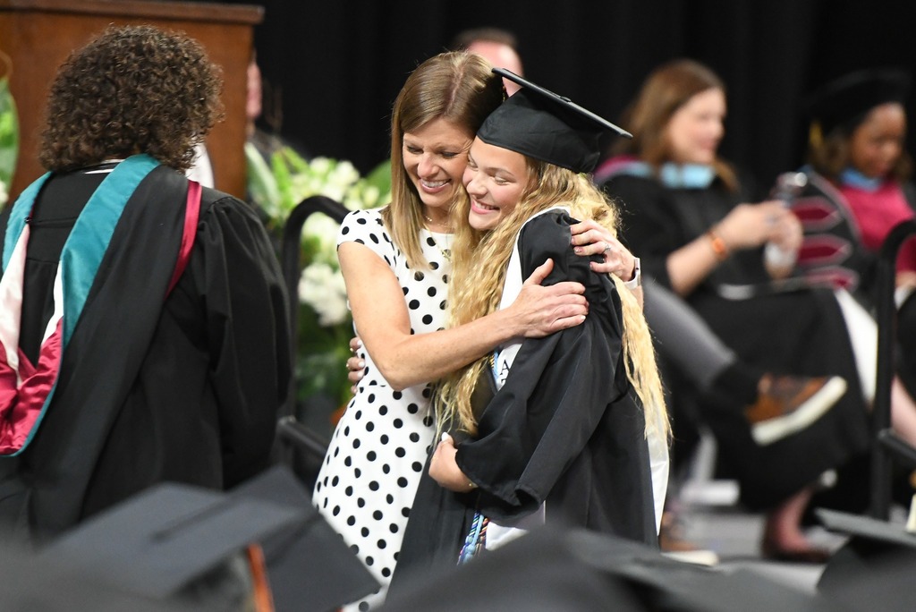 Various photos of Norman High graduation.
