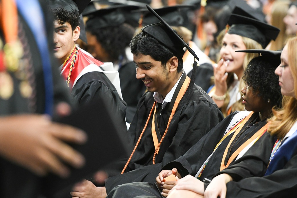 Various photos of Norman High graduation.