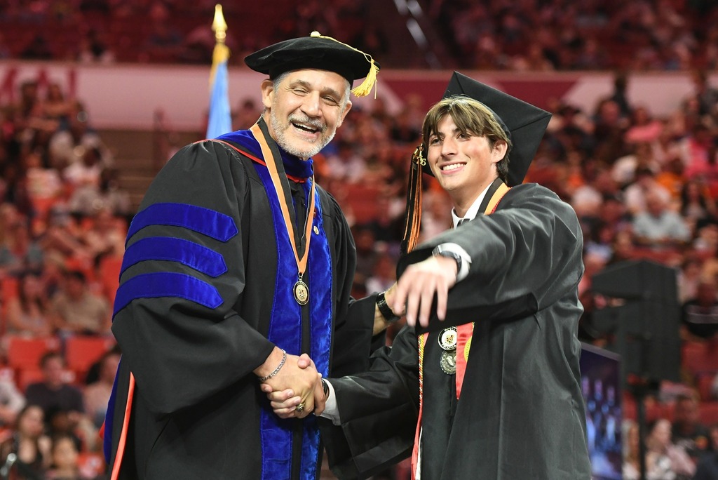Various photos of Norman High graduation.
