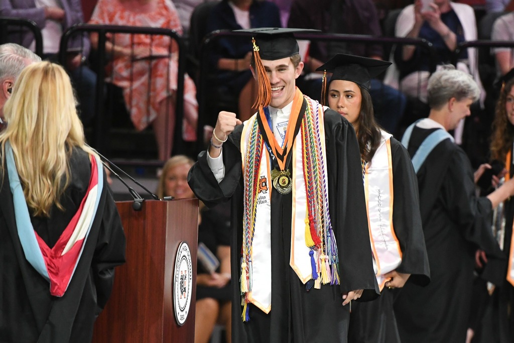 Various photos of Norman High graduation.