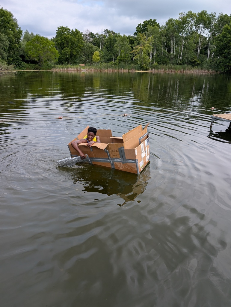 learner in cardboard boat