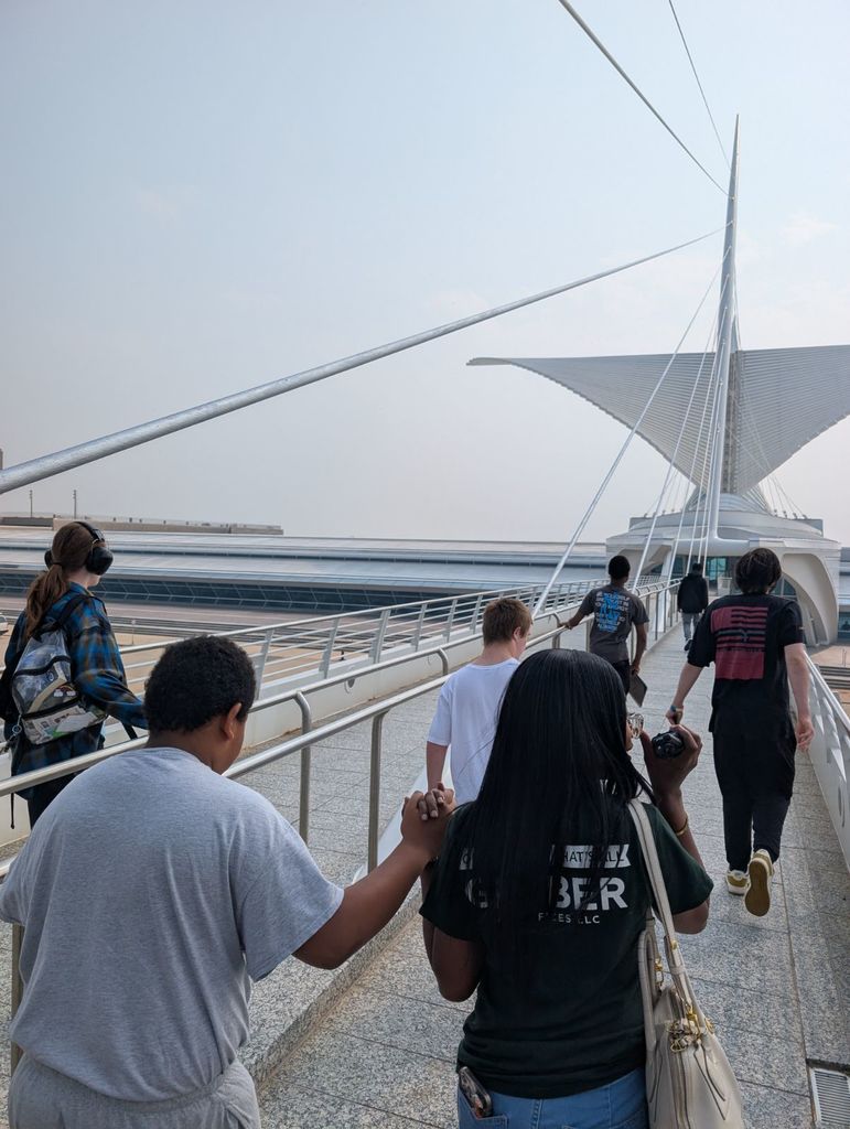 learners and staff walking into the Milwaukee Art museum