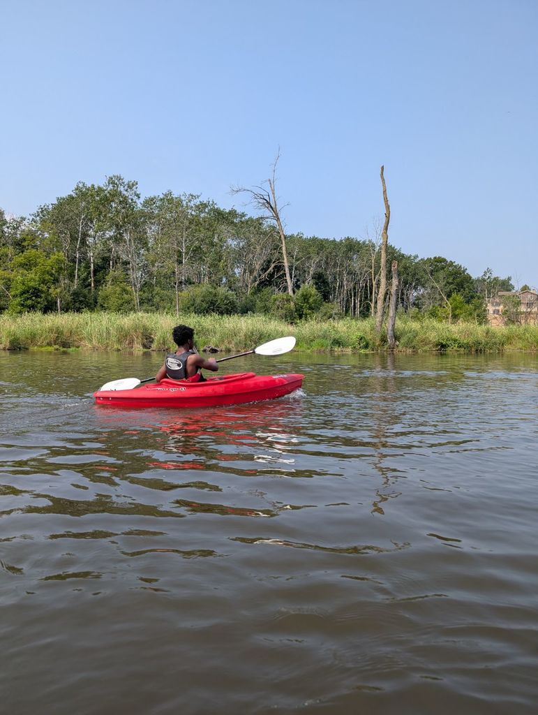 learner kayaking in the river