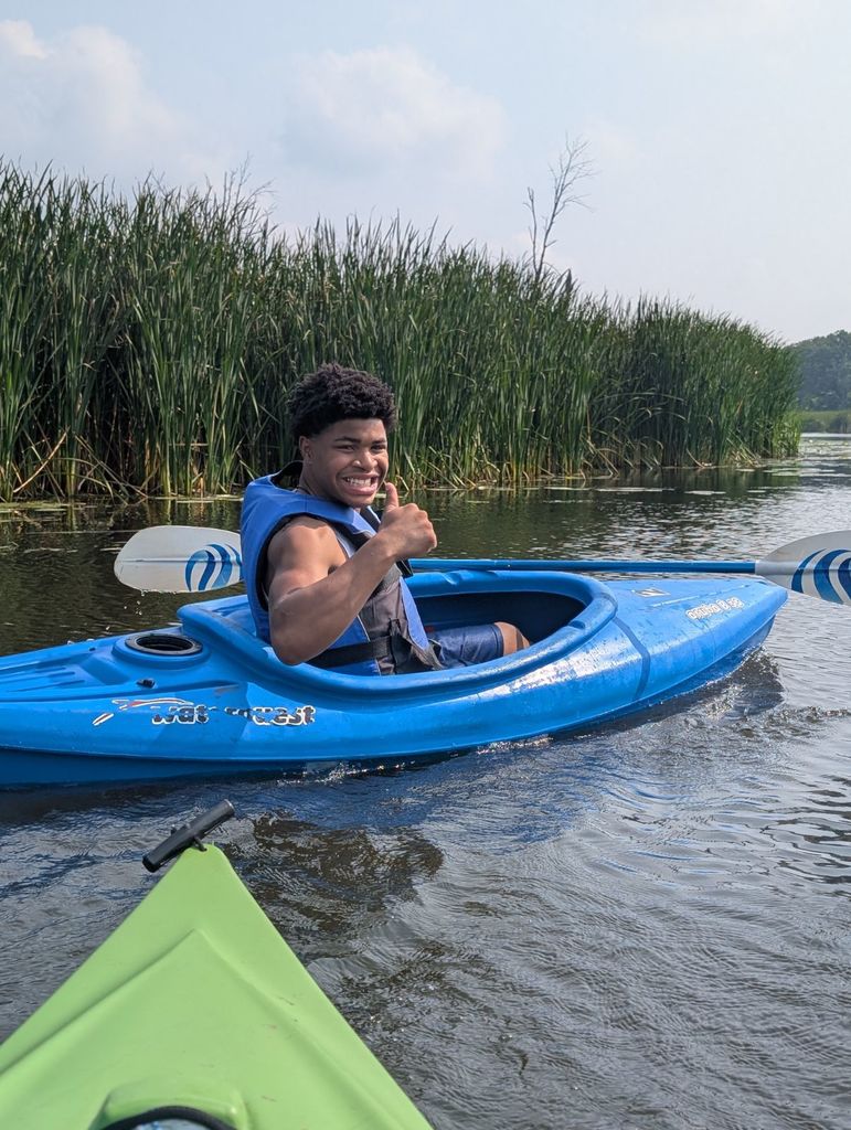 learner kayaking in the river