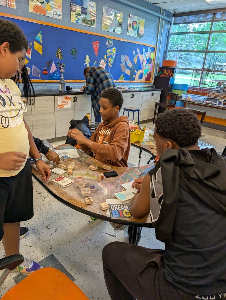 three learners ink stamping tattoos
