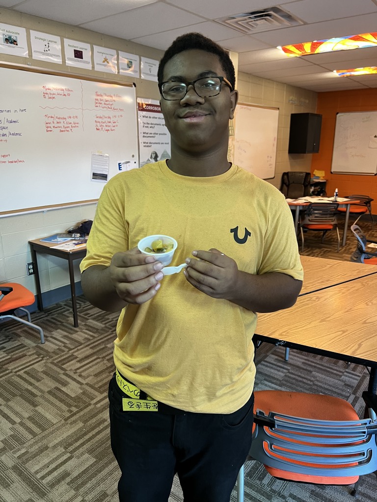 male learner eating stew