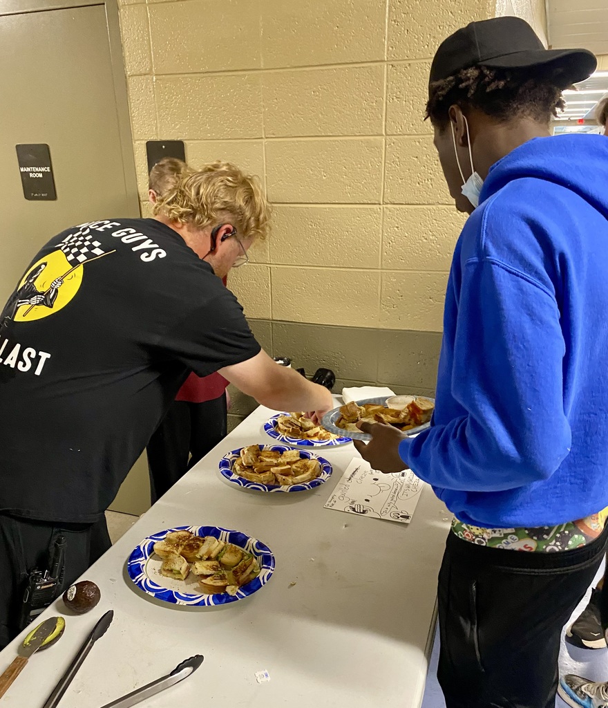 staff serving learn grilled cheese