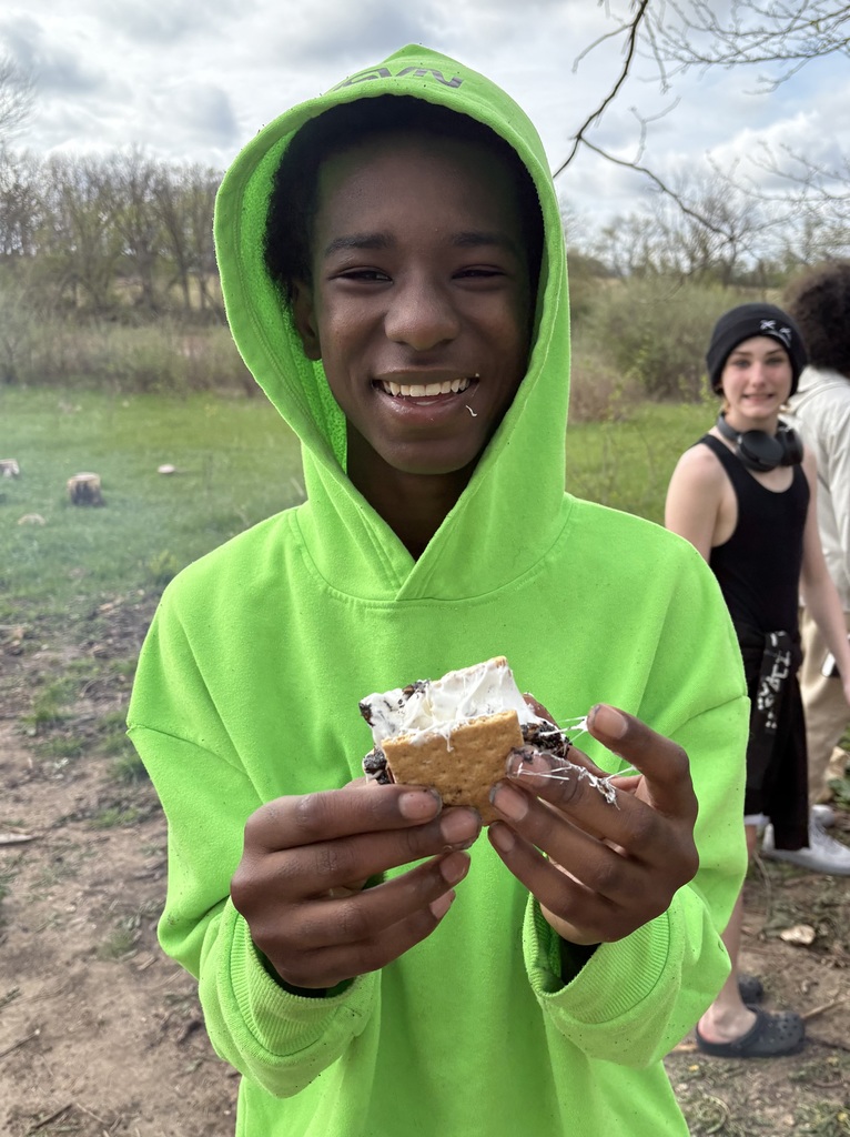 male learner eating a smore