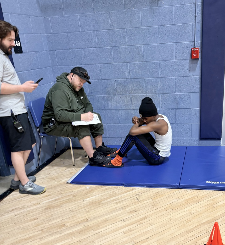 male learner doing a sit up challenge.