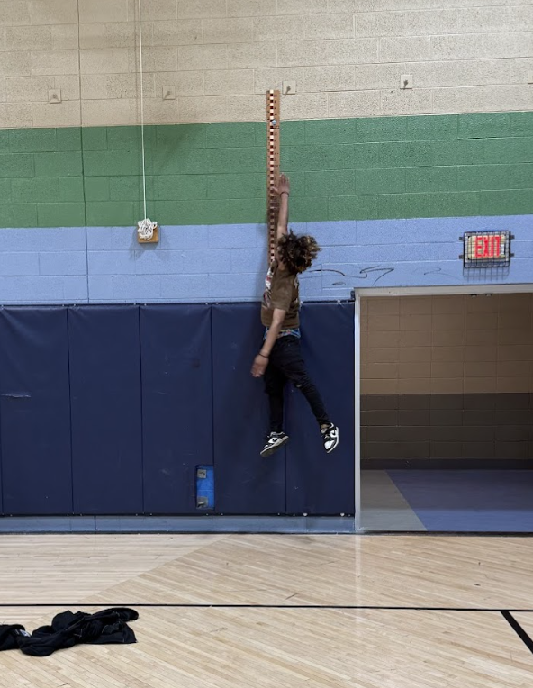 learner participating in the jump reach contest 