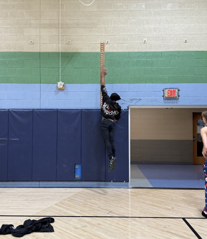 learner participating in the jump reach contest. 