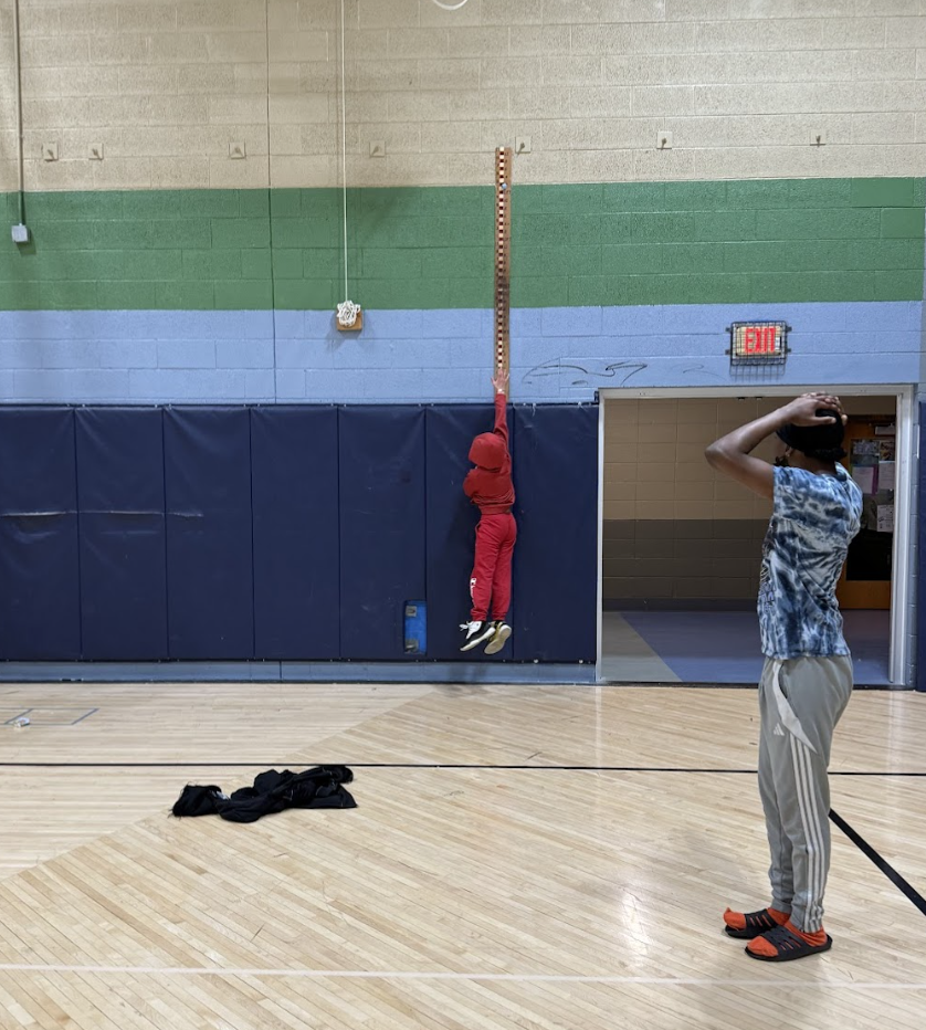 learner participating in the jump reach contest. 