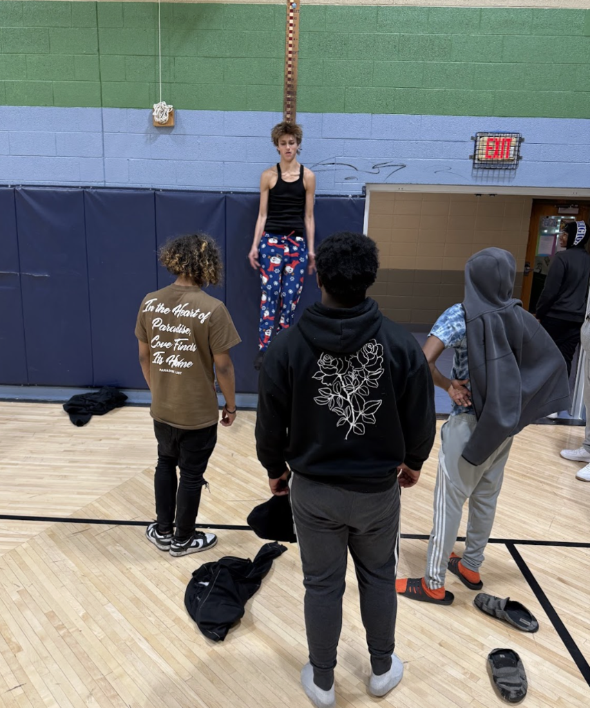 learner participating in the jump reach contest. 