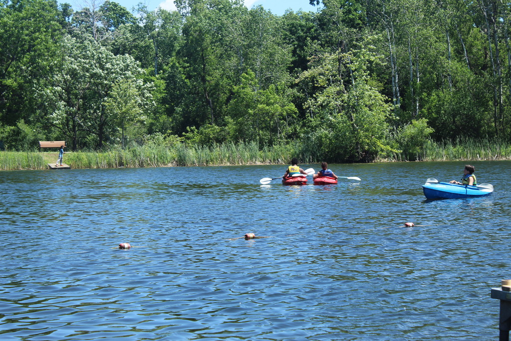 three learners kayaking