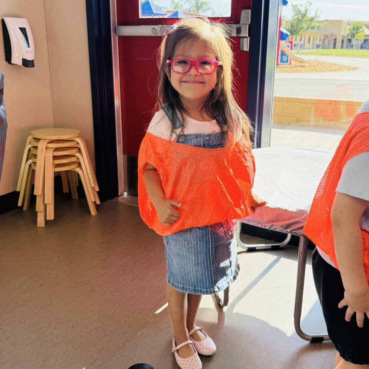 students and staff smiling on the first day of school