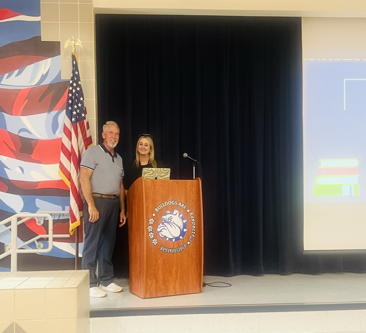 Principal and Dean Smiling