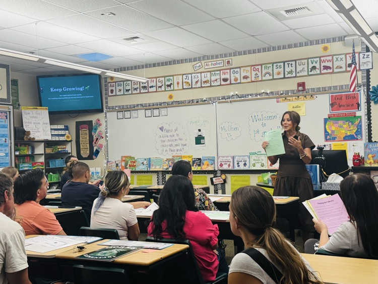 Teacher presenting to parents
