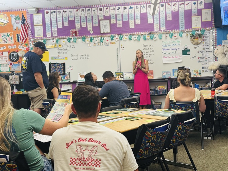 Teacher presenting to parents