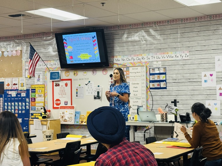 Teacher presenting to parents