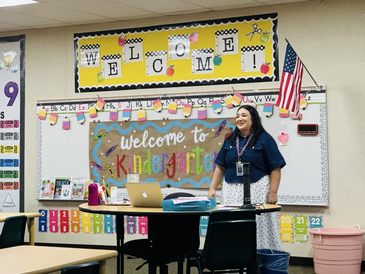 Teacher presenting to parents