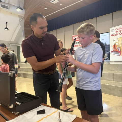 Student sampling an instrument