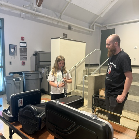 Student sampling an instrument