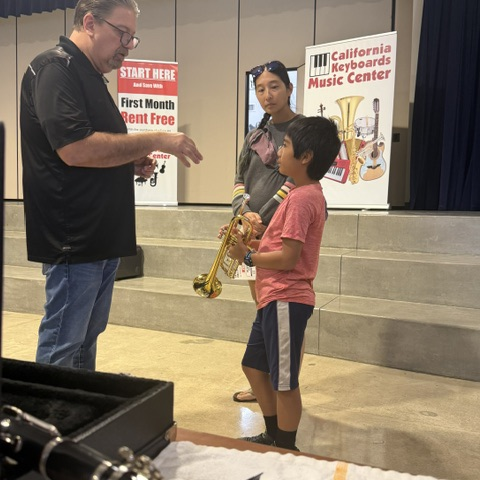 Student sampling an instrument
