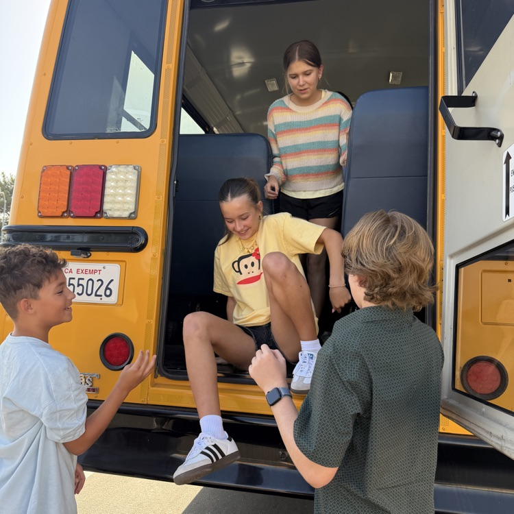 Students exiting bus safely