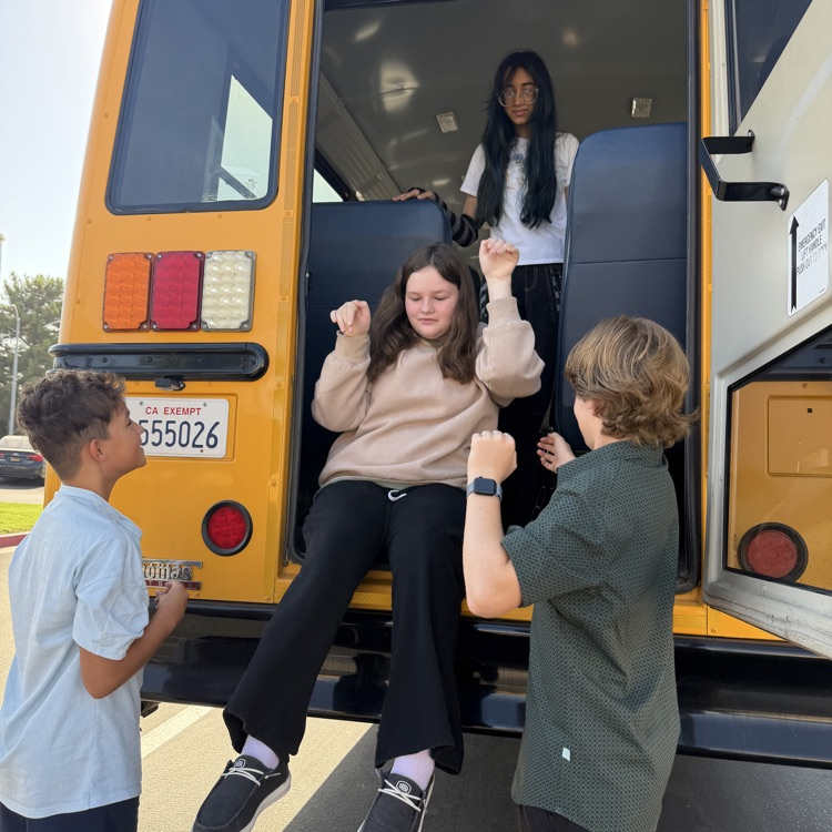 Students exiting bus safely