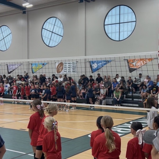 volleyball players getting ready to play