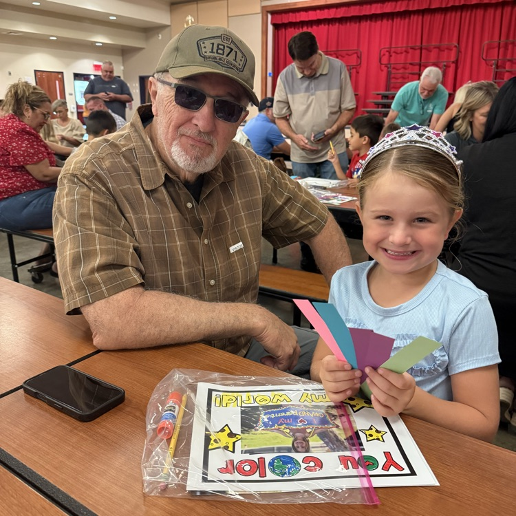 Grandparent doing art with grandchild