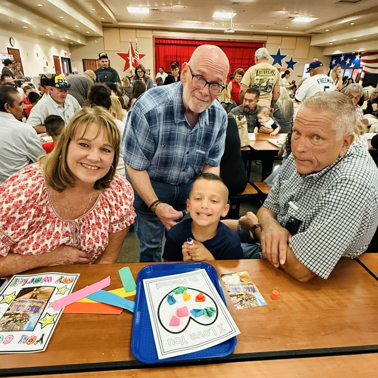 Grandparents doing art with grandchild