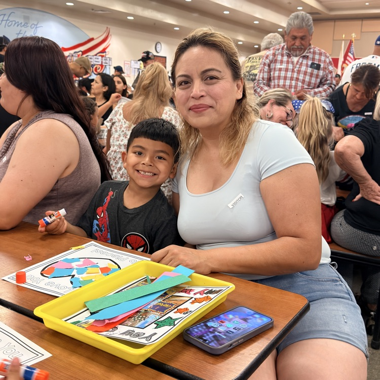 Grandparent doing art with grandchild