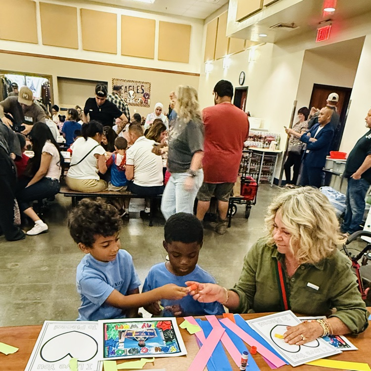 Grandparent doing art with grandchildren