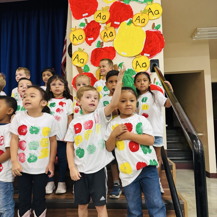 Kindergarten students performing for their families