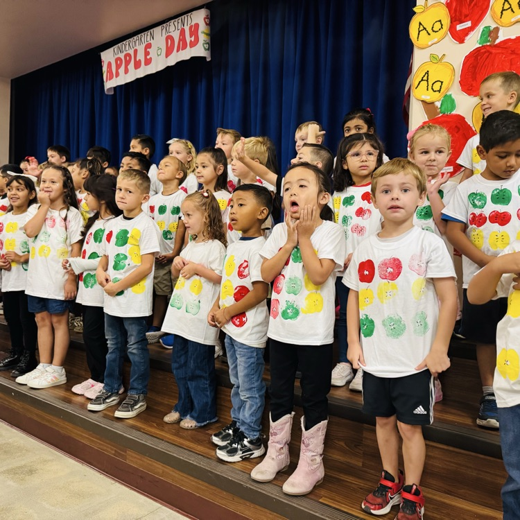 Kindergarten students performing for their families