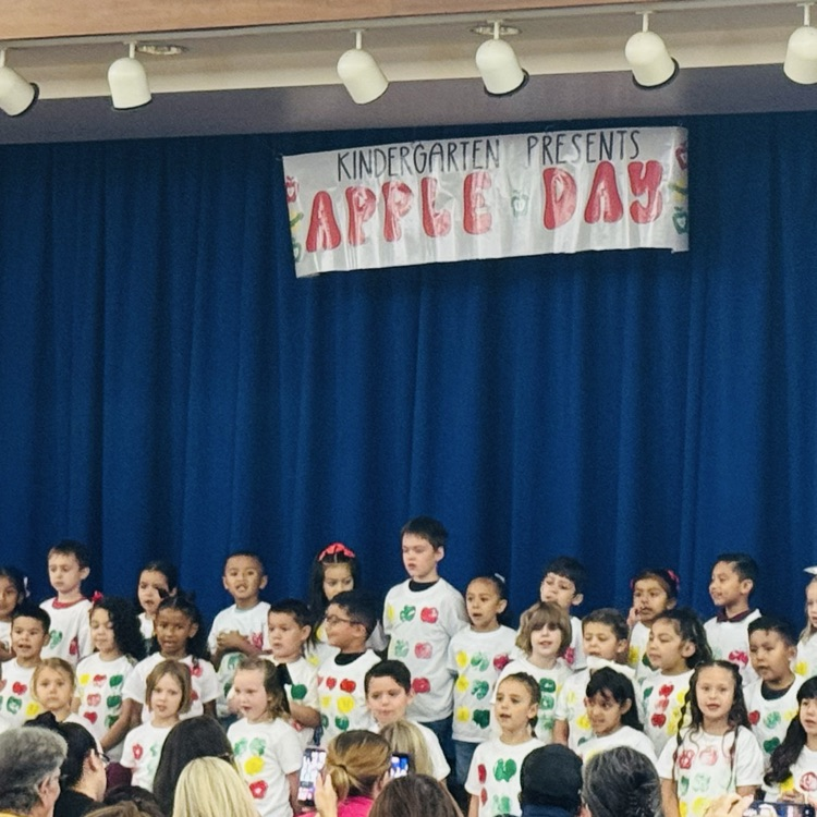 Kindergarten students performing for their families
