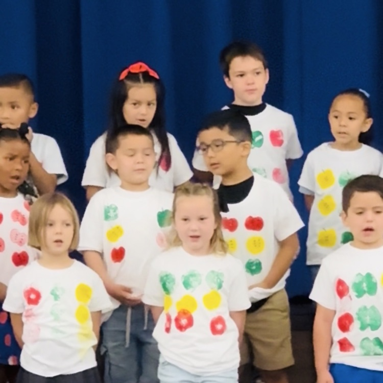 Kindergarten students performing for their families