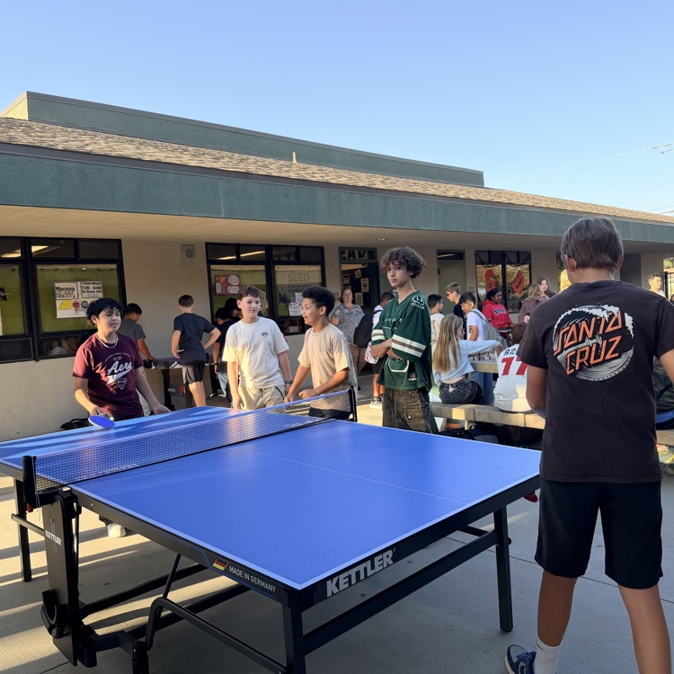 Students playing ping pong