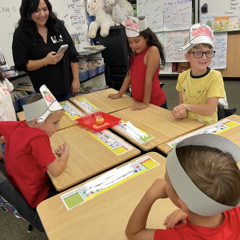 students doing an Apple activity
