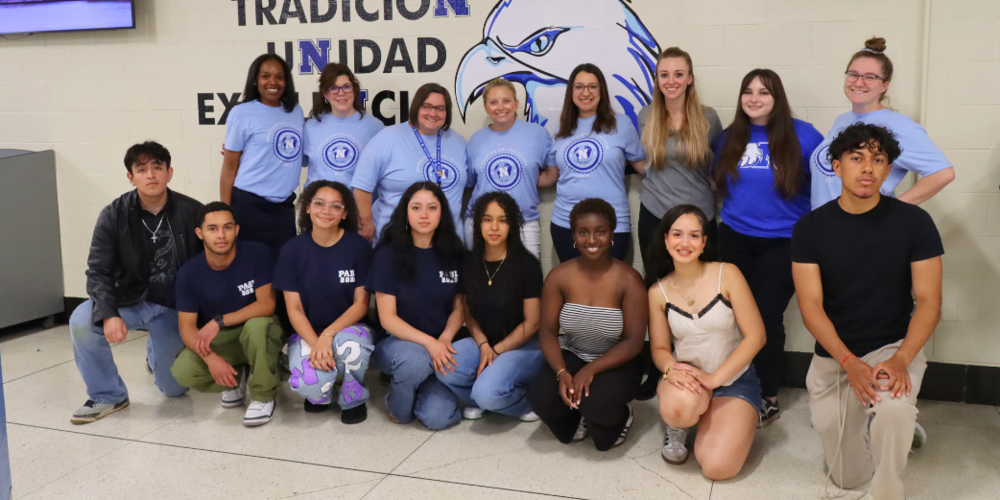 Seal of Biliteracy students and committee pose for group photo.