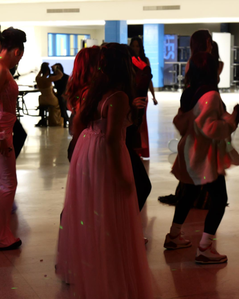 Students dancing on the dance floor during prom