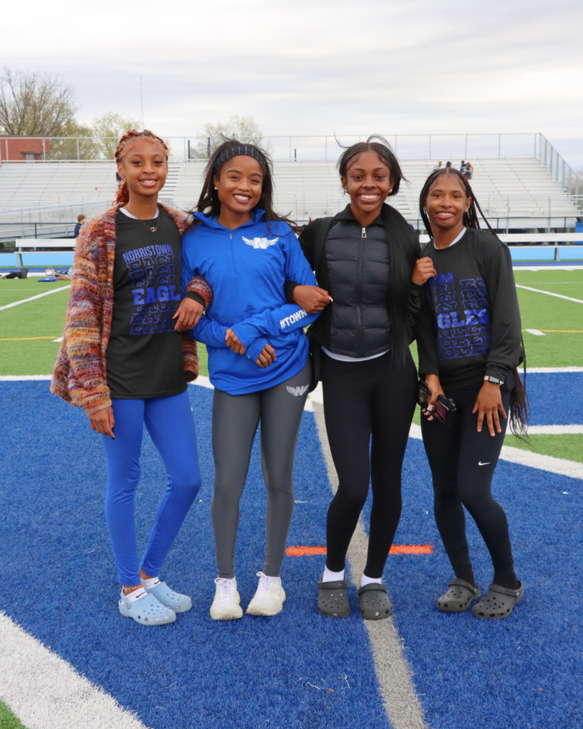 Senior standing with other students