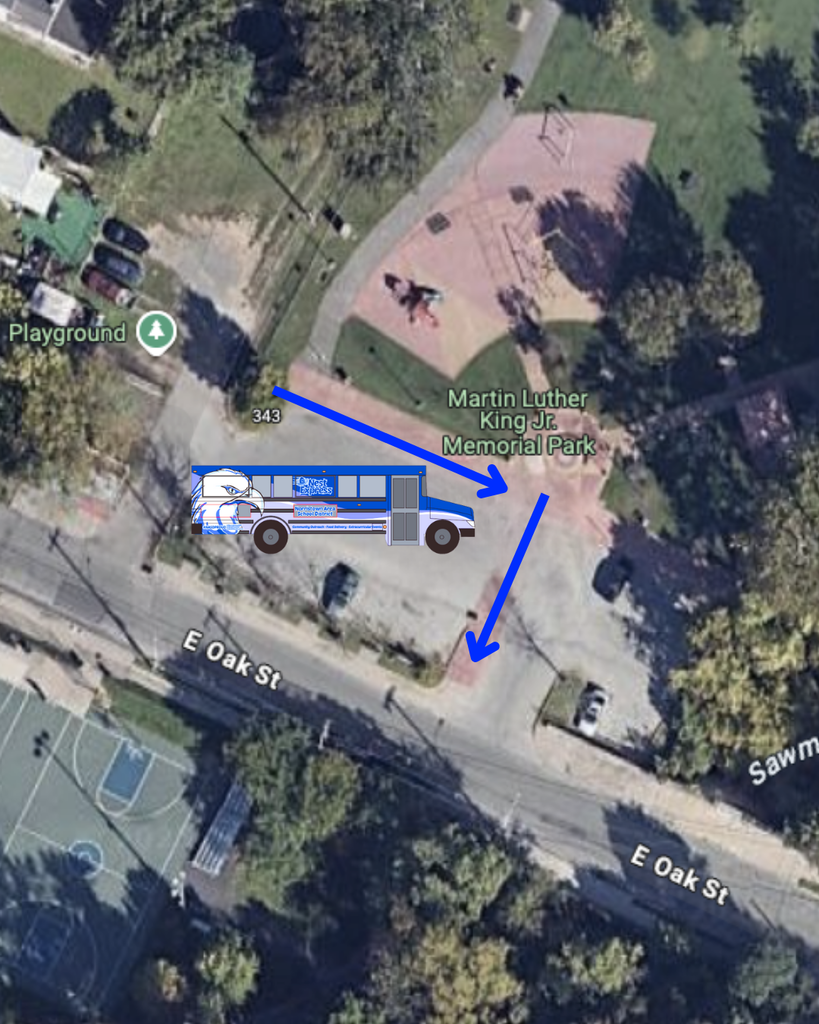 Aerial map showing the Martin Luther King Jr./Simmons Park Complex with blue arrows indicating the walk-up route for meal kit distribution. The Nest Express bus icon is overlayed on the image. Full details in caption.