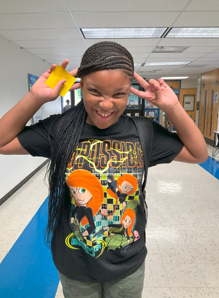 A student excited for the first day of school!