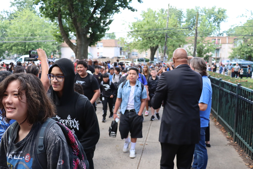 Crowds of students entering Blockson Middle School.  More information in caption